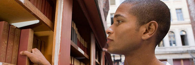 Volunteer looking a book